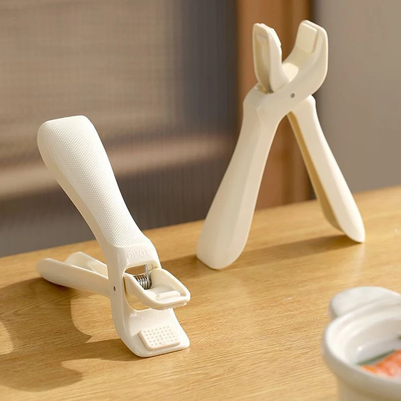Staple Kitchen Anti-Scalding Lifter Gadget 2024; Silicone, Heat Resistant Plate, Bowl, and Pot Holder Clip. - Image 3